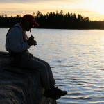 Evening flute recital at Thursday Bay on Crooked Lake; Robin Reilly.